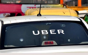 SoftBank-backed Grab acquires Uber's Southeast Asia business