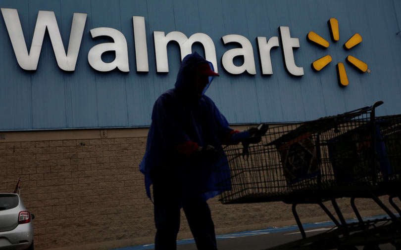 Walmart cuts earnings outlook on Flipkart buy, expects e-commerce growth to slow
